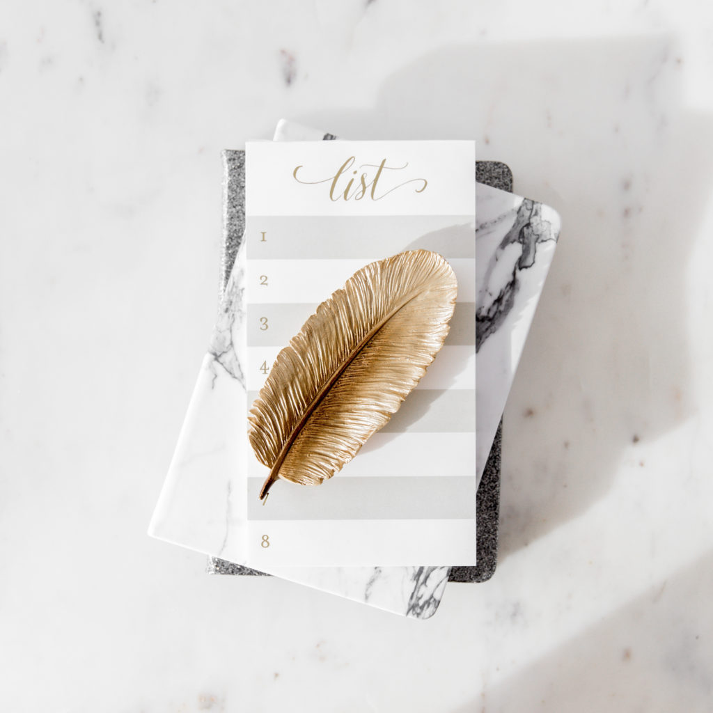 feather on books